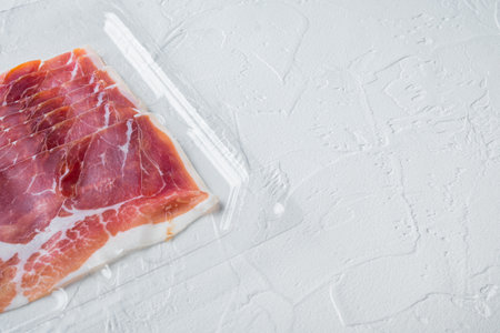 Gourmet, manually sliced jamon set, on white background with copy space for textの写真素材