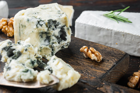 Blue cheese Gorgonzola set, on dark wooden backgroundの写真素材
