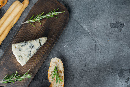 Appetizers table with differents antipasti set, on gray background, top view with copy space for textの写真素材