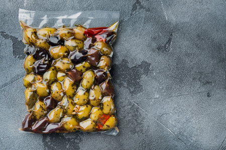 Italy fresh olives, on gray background, top view with copy space for textの写真素材