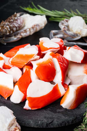 Fresh Crab meat stick surimi set, on black backgroundの写真素材
