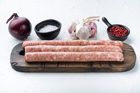 Beef sausages, on white background.の写真素材