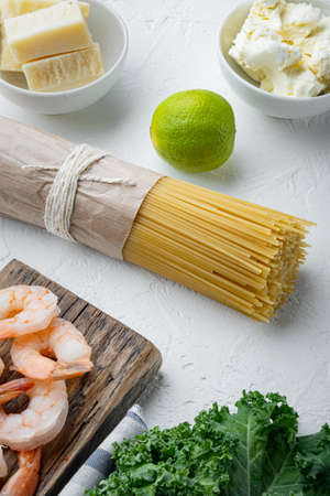 Cooking italian food, seafood pasta set, on white backgroundの写真素材