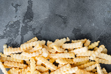 Frozen fries set, on gray background, top view flat lay, with copyspace and space for text