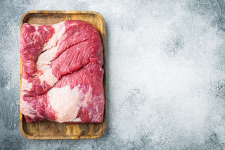 Raw veal calf brisket beef set, on gray stone background, top view flat lay, with copy space for textの写真素材