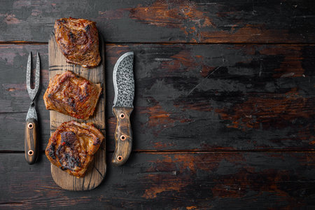 Homemade Braised Beef Short Ribs set, on old dark wooden table background, top view flat lay, with...