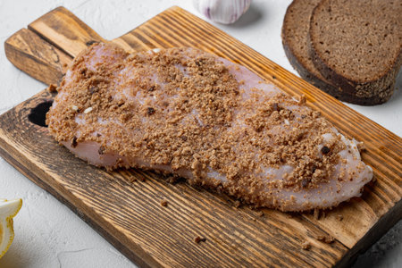 Crispy garlicky chicken raw ingredient on white background