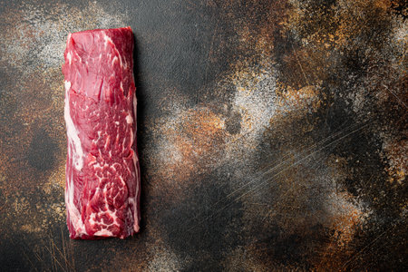 Fresh Raw Beef steak Mignon whole cut set, on old dark rustic background, top view flat lay, with copy space for textの写真素材