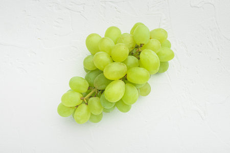 Natural organic juicy grapes set, green fruits, on white stone background, top view flat lay, with...