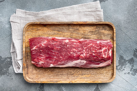 Fresh raw Prime Black Angus beef steaks set, Filet mignon cut, on gray stone background, top view...