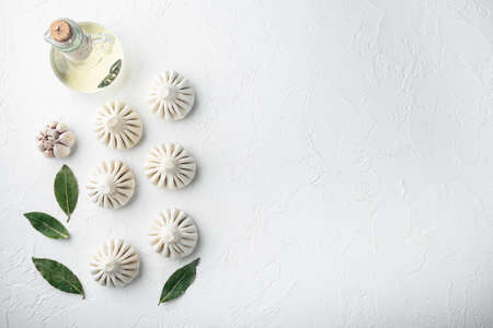 Khinkali, Georgian dumplings, traditional Georgian cuisine set, on white stone surface, top view flat lay, with copy space for textの写真素材