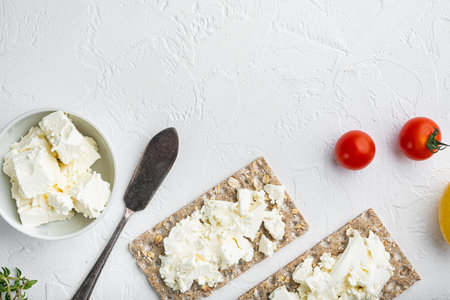 Crisp bread sandwich set, on white stone table background, top view flat lay, with copy space for...