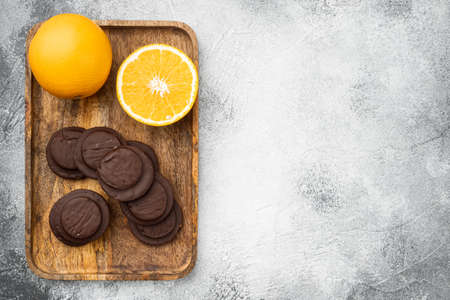 Orange Chocolate coated biscuit cakes set, on gray background, top view flat lay, with copy space for textの写真素材