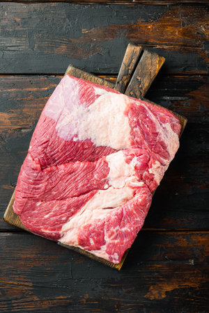 Raw veal calf brisket beef set, on old dark wooden table background, top view flat layの写真素材