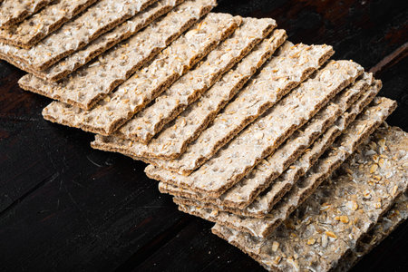 Grain diet light crisp bread set, on old dark wooden table background