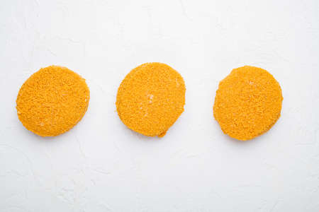 Raw fishcake Breaded set, on white stone table background, top view flat lay, with copy space for textの写真素材