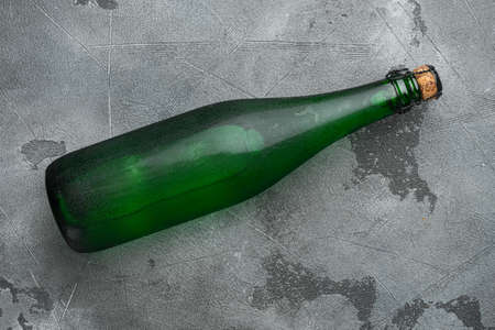 Bottle of water set, on gray stone table background, top view flat lay, with copy space for textの写真素材