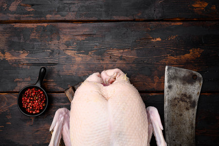 Raw whole Duck meat set, on old dark wooden table background, top view flat lay, with copy space for textの写真素材