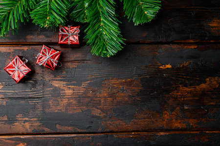 Christmas tree decoration set, top view flat lay on old dark wooden table background, with copy space for textの写真素材