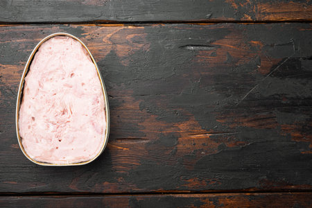 Canned ham set, on old dark wooden table background, top view flat lay, with copy space for textの写真素材