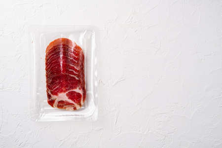 Italian meat cold cuts pack set, on white stone table background, top view flat lay, with copy space for textの写真素材