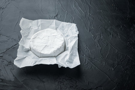 Farm cheese camembert set, on black background with copy space for text