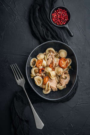 Pasta almentica with seafood, on black background, flat layの写真素材