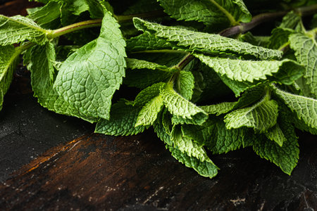 Fresh mint leaves herb set, on old dark  wooden table background