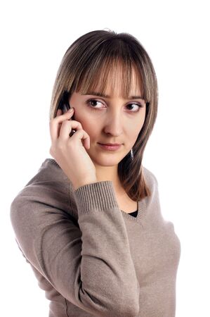 young female with mobile phone  isolated on whiteの写真素材