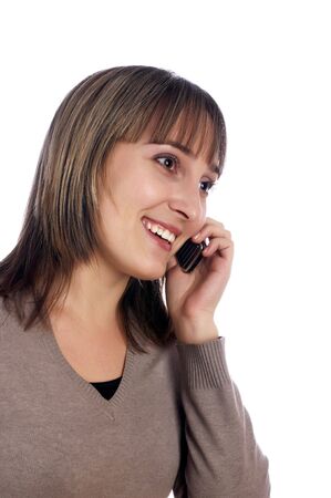 young female with mobile phone  isolated on whiteの写真素材
