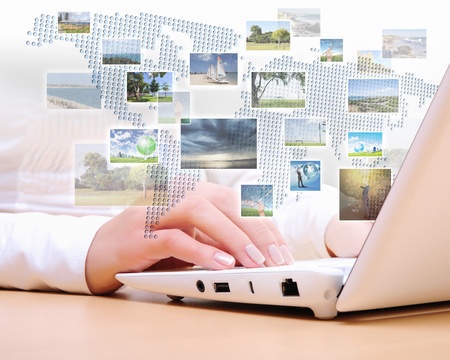 Collage with white laptop computers and symbols of communicationの写真素材