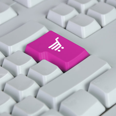 Computer keyboard with on-line shopping symbol on itの写真素材