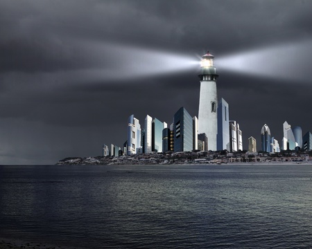 Collage with lighthouse at night with beam of lightの写真素材