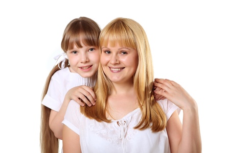 portrait of mother together with daughter in studioの写真素材