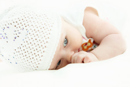 Portrait of a newborn baby girl indoorsの写真素材