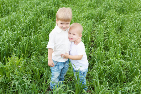 Portrait of happy boys in the summer outdoorsの写真素材