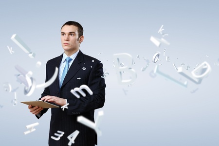 Businessman making presentation against modern technology backgroundの写真素材