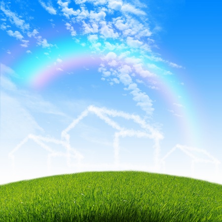 Picture of a house from white clouds against blue skyの写真素材