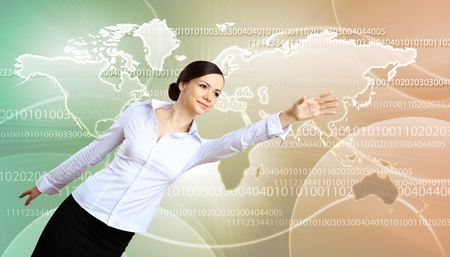 Young woman in business wear with touchscreen technology backgroundの写真素材