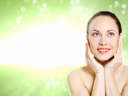 Studio portrait of young beautiful woman natural lookの写真素材