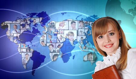 Young woman standing against world map backgroundの写真素材