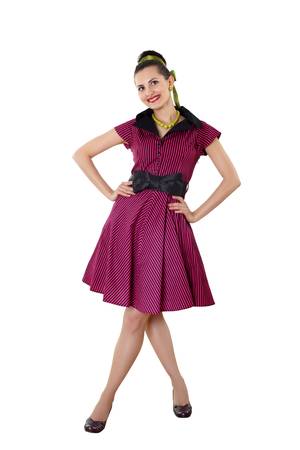young woman in bright colour dress in 60 s styleの写真素材