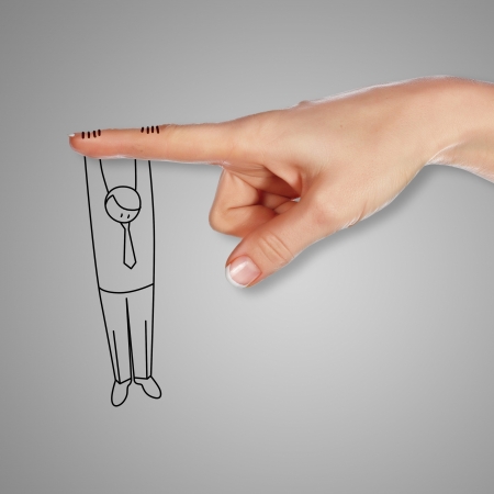 Drawing of a man in dangerous situation under threatの写真素材