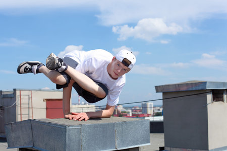 portrait of a young male street dancer outdoors