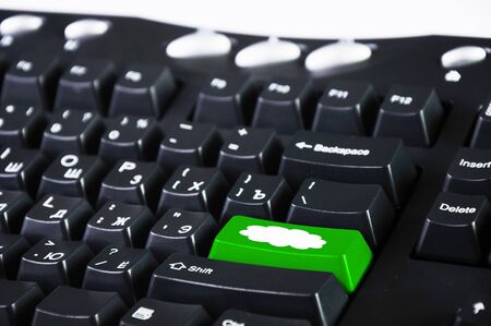 Image of computer keyboard with clous symbol on itの写真素材