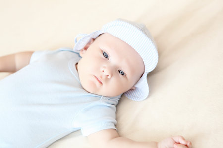 Portrait of a newborn baby boy indoors