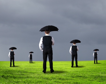 Collage with young businessman against weather backgroundの写真素材