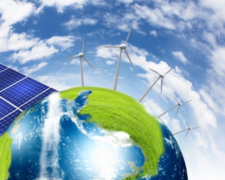 Green planet earth with solar energy batteries installed on itの写真素材