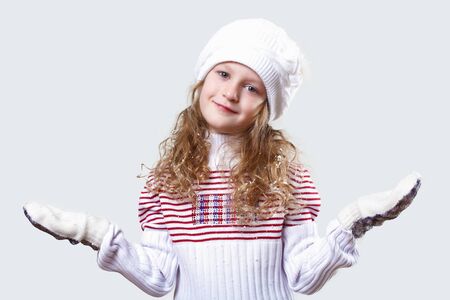 Cuty little girl in winter wear happy about new yearの写真素材