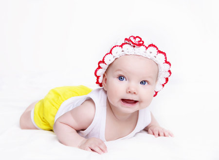Portrait of a newborn baby girl indoors
